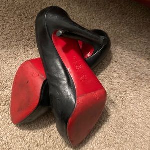 Christian Louboutin black pumps